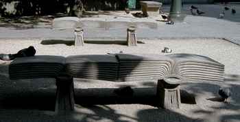 Square G. Pierne, with benches that look like open books.