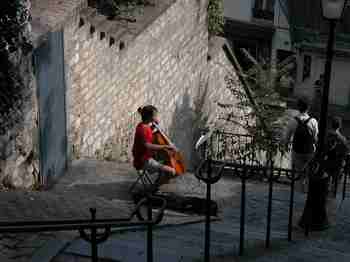 Cellist plays on Montmartre.