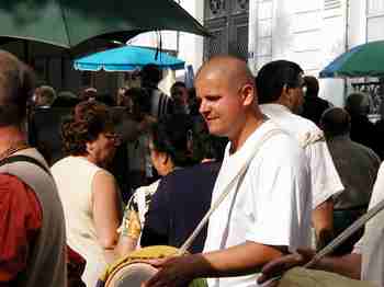 A Hare Krishna group works its way, chanting, through the crowds on Montmartre.