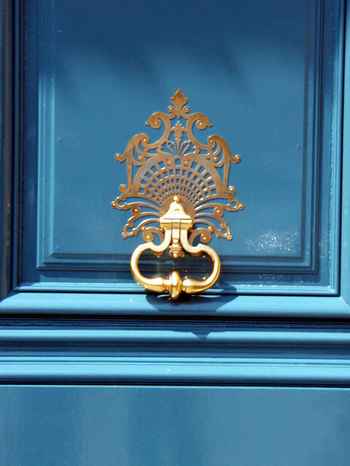 Polished door knocker on Place Vendome.