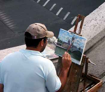 Artist painting the Pont Alexandre III.