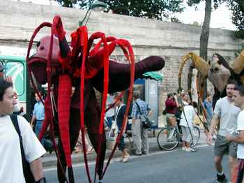 Spiders appear among beachwalkers.